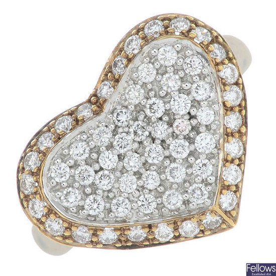 A brilliant-cut diamond bi-colour heart-shape ring.