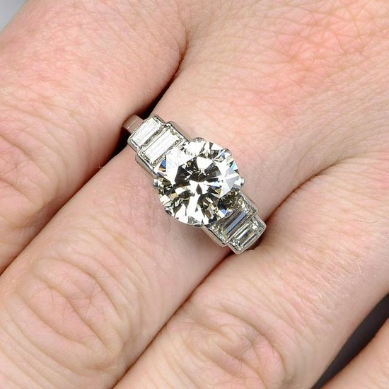 A brilliant-cut diamond single-stone ring, with
