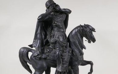 A bronzed spelter figure of an Arab on horseback,...