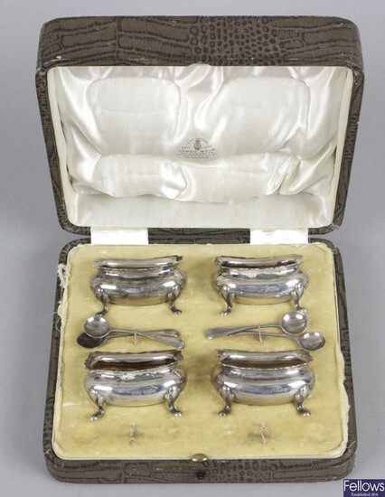 A cased set of four Edwardian silver salts & matched spoons, plus a late Victorian pepper pot and three modern weighted examples.