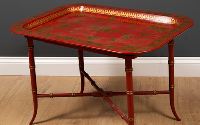 A chinoiserie style tray top table