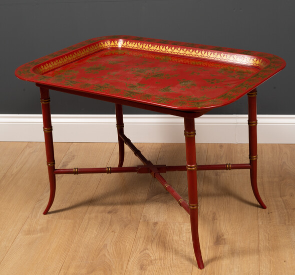 A chinoiserie style tray top table