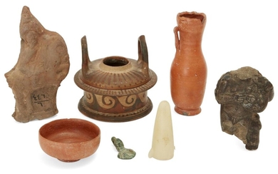 A collection of antiquities and later artefacts Circa 4th Century B.C. and Later Including a Greek pottery lebes gamikos, the reel-shaped body decorated with a wave pattern, fired orange on buff ground, the shoulder with radiating strokes, small...