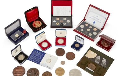 A collection of commemorative coins and medals, comprising: a cased 1978 Greek coin; two cased Royal Mint Queen Elizabeth II 1977 silver proof crowns commemorating The Queen's Silver Jubilee; Mint Bureau Japan, a cased set of seven proof coins...