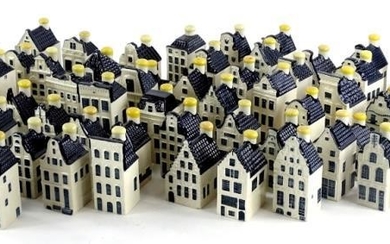 A collection of sixty five KLM blue Delft houses...