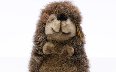 A collectors vintage Steiff hedgehog plush toy with glass eyes,...