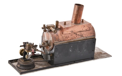 A copper horizontal model boat boiler and a small live steam boat engine