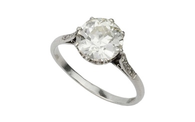 A diamond solitaire ring, the old brilliant cut stone of...