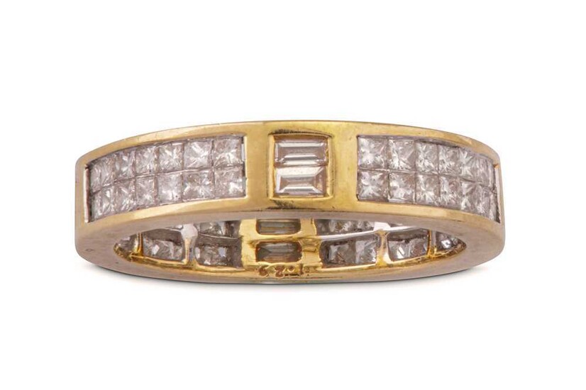 A gold and diamond eternity ring