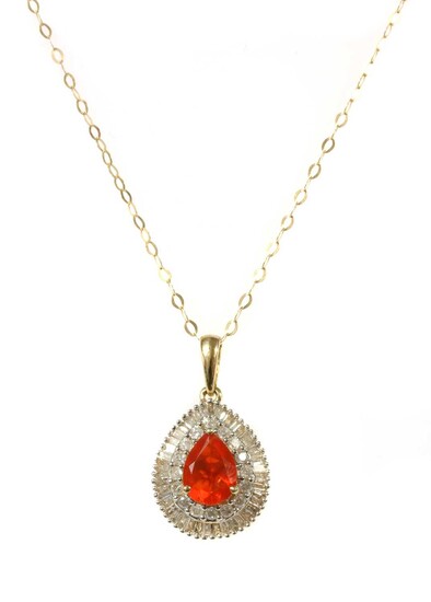 A gold fire opal and diamond cluster pendant