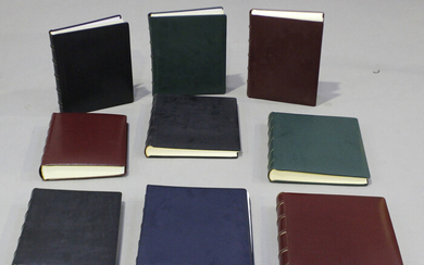 A group of nine modern Italian leather bound photograph albums, retailed by Harrods, some boxed.