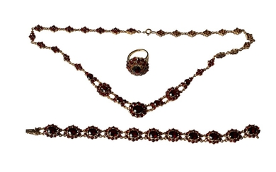 A jewellery lot comprising of a 14k gold garnet cluster necklace with matching gold bracelet...