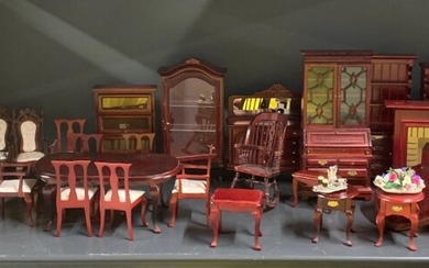 A large quantity of dolls house wooden living room furniture, including a piano and a Chippendale style extending table and chairs.