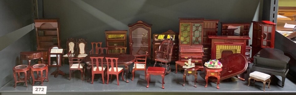 A large quantity of dolls house wooden living room furniture, including a piano and a Chippendale style extending table and chairs.