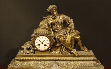 A late 19th century brass figural mantel clock, 9.5cm enamel...