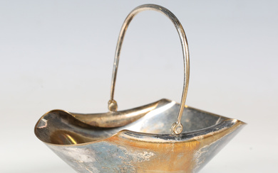 A late Victorian Aesthetic Movement plated basket, designed by Dr Christopher Dresser for Hukin &amp