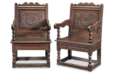 A pair of Charles II joined oak panel-back open armchairs, Cheshire, circa 1680