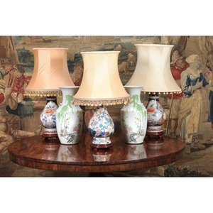 A pair of Chinese Imari style porcelain pear shaped vases