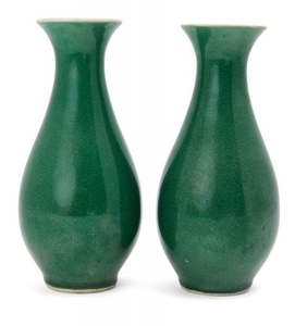 A pair of Chinese monochrome porcelain vases,...