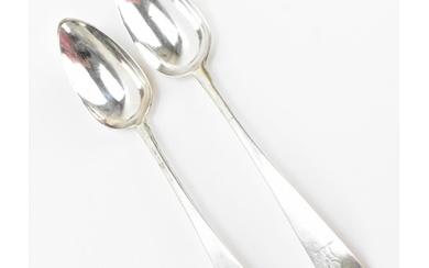 A pair of George III Irish silver serving spoons by John Shi...