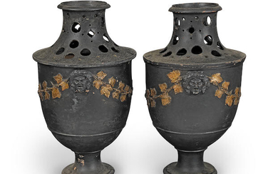 A pair of Neapolitan black and gilt painted terracotta urns