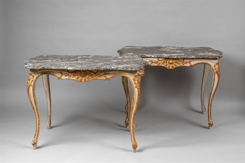 A pair of Rococo style hardwood tables