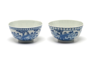 A pair of blue and white porcelain small bowls each painted with birds on flower branches pattern