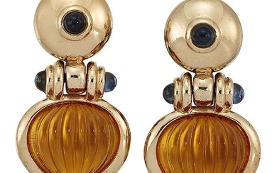 A pair of citrine and sapphire earclips, the...