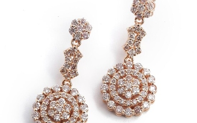 SOLD. A pair of diamond ear pendants each set with numerous brilliant-cut light pink diamonds weighing a total of app. 2.00 ct., mounted in 14k pink gold. (2) – Bruun Rasmussen Auctioneers of Fine Art
