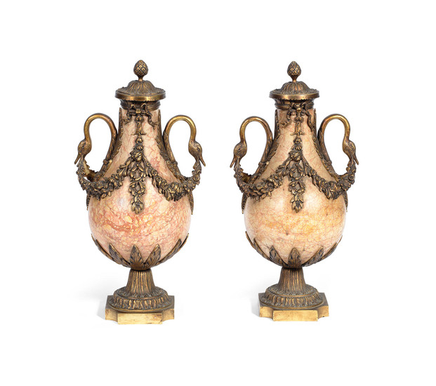 A pair of early 20th century French gilt bronze mounted garniture urns