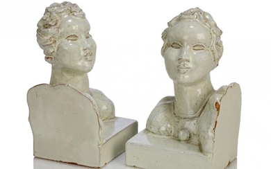 A pair of glazed terracotta bookends, possibly Austrian and in...