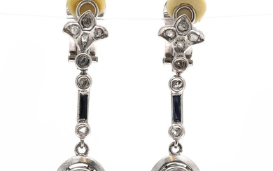 A pair of sapphire and diamond ear pendants each set with eight diamonds and a sapphire, mounted in silver. L. app. 3.5 cm. (2) – Bruun Rasmussen Auctioneers of Fine Art