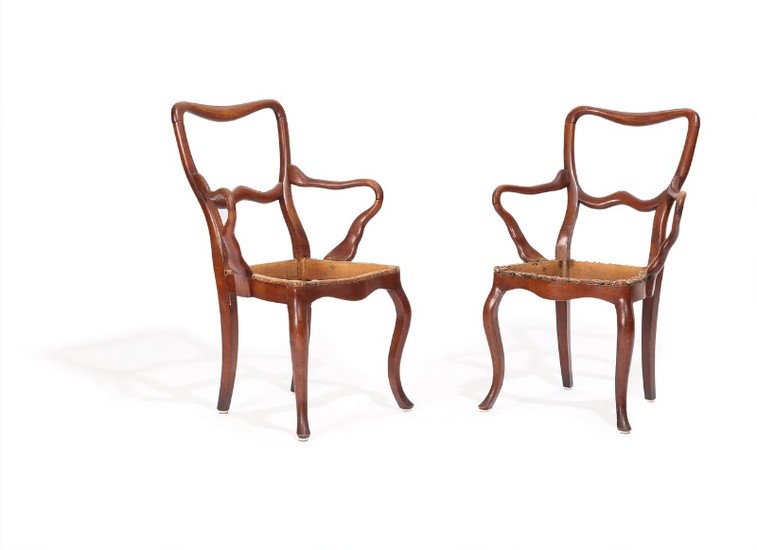 A pair of stained beech armchairs, curved armrests and cabriole legs. 19th century. (2)