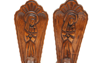 A pair of wooden wall candlesticks, 20th century.