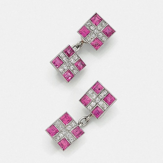 A pink sapphire, diamond and platinum pair of cufflinks, circa 1920.