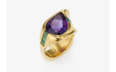 A ring with an amethyst and green-blue tourmalines