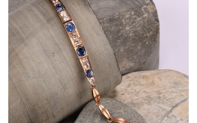 A rose metal mounted bluie and white sapphire articulated br...