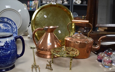A selection of assorted brass and copper including kettle, trivet and jug.