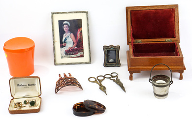 A selection of vintage trinkets, including a tiny English sterling...