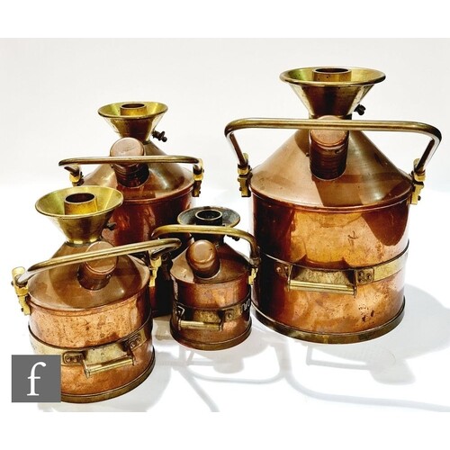 A set of four mid 20th Century copper and brass Chekpump for...