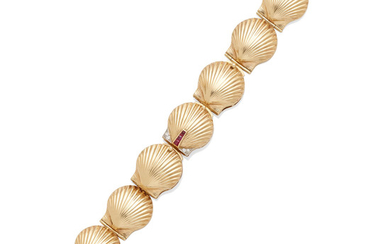 A shell motif bracelet watch