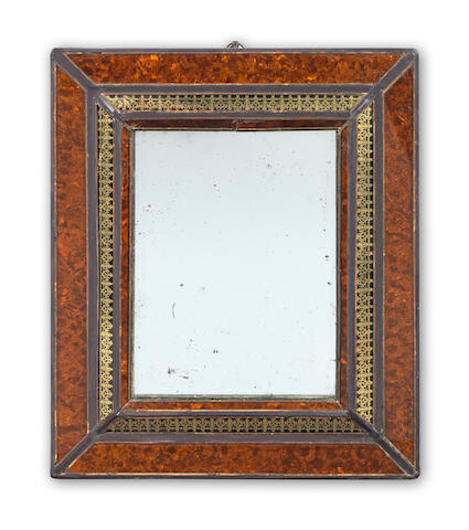 A simulated tortoiseshell and verre eglomise mirror of small size
