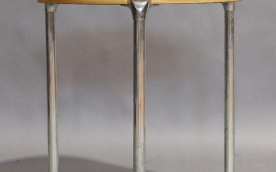 A white laminate circular tripod coffee table, late 20th century, raised on cylindrical chrome supports, 51cm high, 45cm diameter