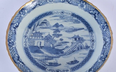AN 18TH CENTURY CHINESE BLUE AND WHITE PORCELAIN SCALLOPED DISH Yongzheng/Qianlong. 22 cm wide.