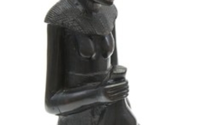 AN AFRICAN EBONY CARVING