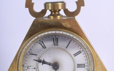AN ANTIQUE INDUSTRIAL STYLE BRONZE CLOCK inset with a