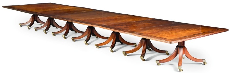 AN IMPORTANT IRISH REGENCY ROSEWOOD BANDED MAHOGANY SEVEN PEDESTAL DINING TABLE, CIRCA 1815, ATTRIBUTED TO MACK, WILLIAMS AND GIBTON