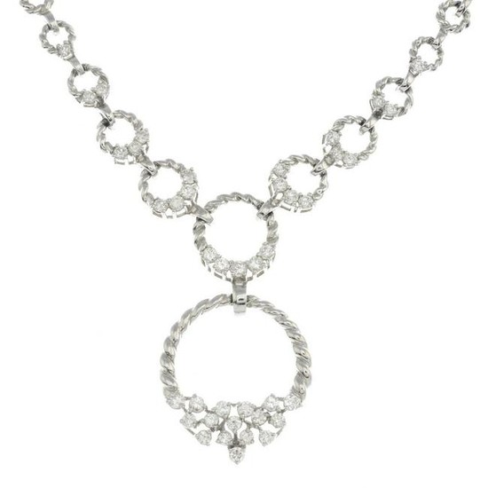 An 18ct gold diamond and woven motif necklace.Estimated