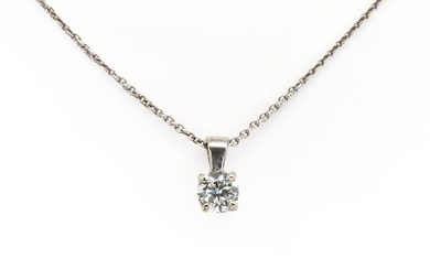 An 18ct white gold single stone diamond pendant and chain