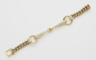 An 18kt yellow gold and diamond bridle bracelet.